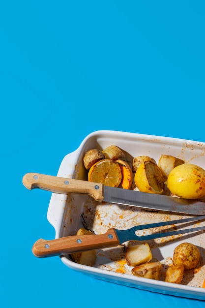 Free Photo leftover baked food in tray high view