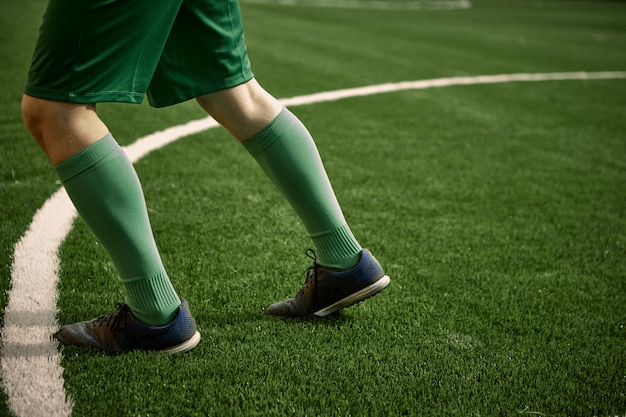 Free photo the legs of soccer football player