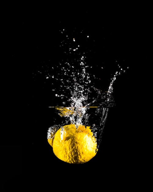 Lemon plunging into the water