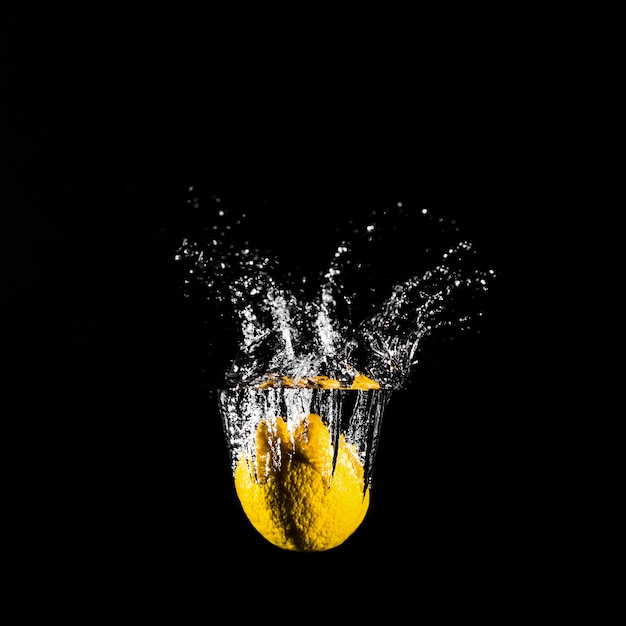 Lemon plunging into the water