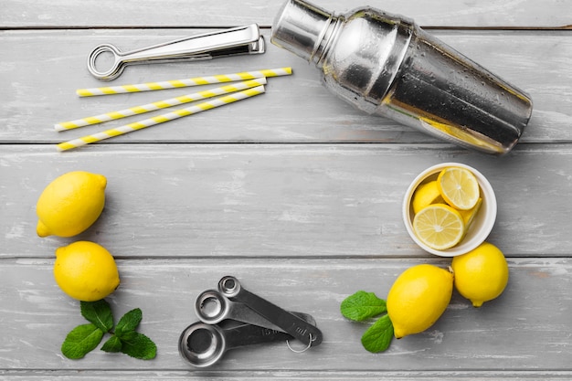 Free photo lemons with mint and shaker