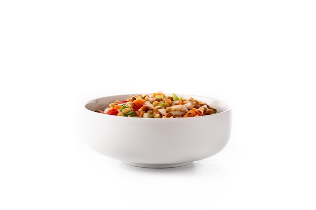 Lentil salad with peppersonion and carrot in a bowl isolated on white background