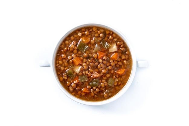 Lentil soup with vegetables in bowl isolated on white background