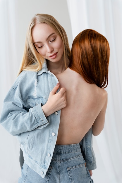 Free photo lesbian partners posing medium shot