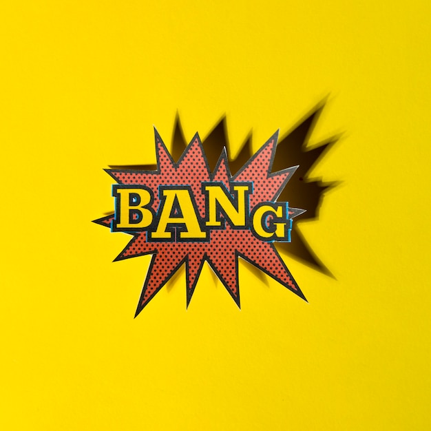 Free photo lettering bang boom star with shadow on yellow background