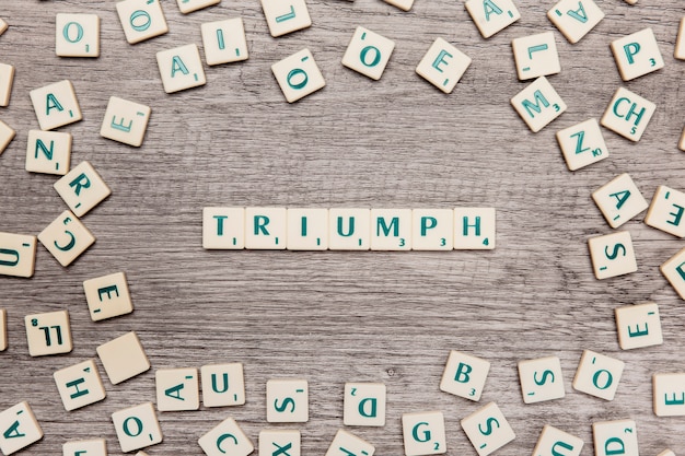 Free photo letters forming the word triumph