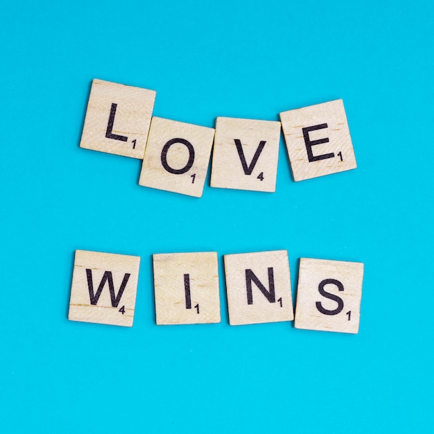 Free photo lgbt slogan love wins lettering