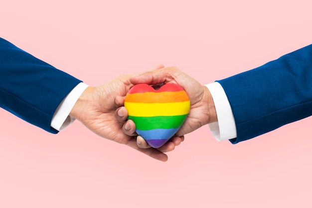 Free photo lgbtq+ community heart with hands united