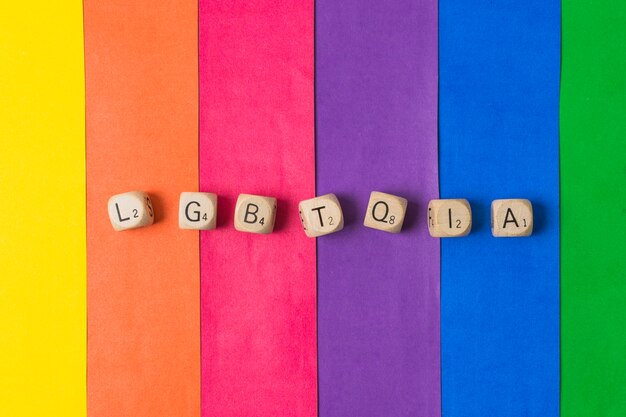 Free Photo lgbtqia word of cubes and gay flag