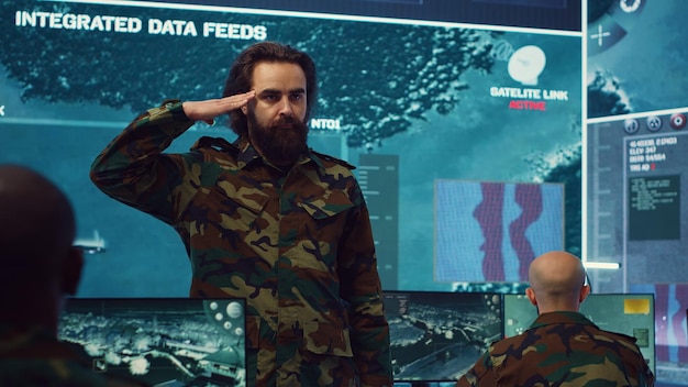 Free photo lieutenant showing the solemn salute symbol in front of the major general