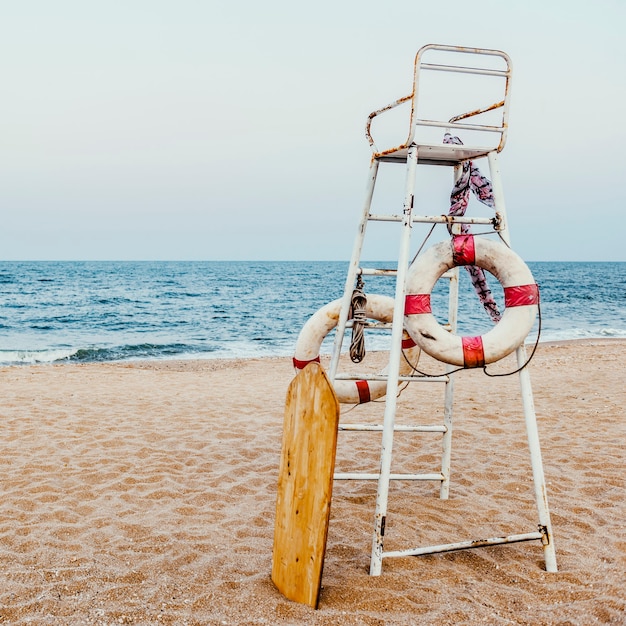 Free photo life guard chair flotation buoy sea shore concept