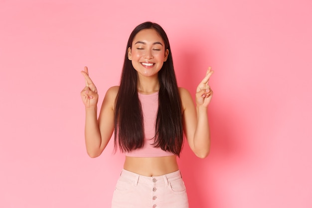 Lifestyle beauty and women concept portrait of hopeful happy asian girl in summer clothes making wis...