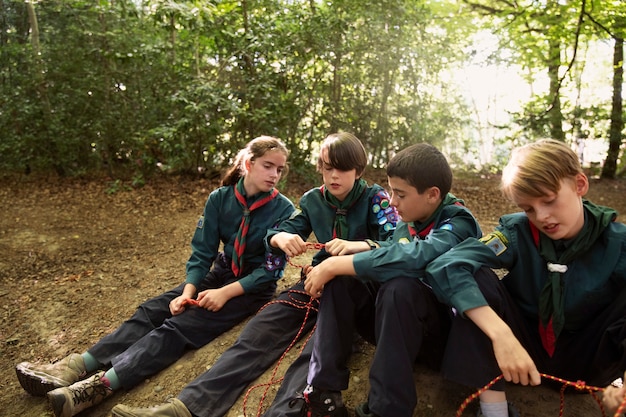 Free photo lifestyle of  boy scouts in the woods