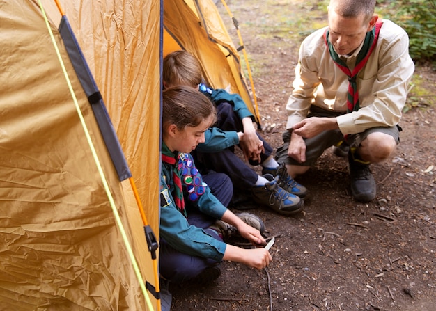 Free photo lifestyle of  boy scouts in the woods