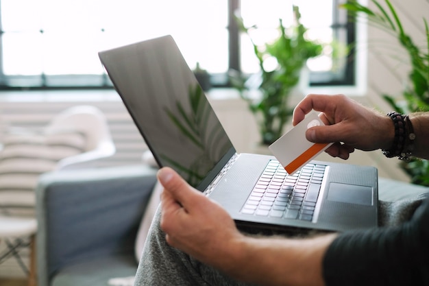 Free Photo lifestyle. man at home with laptop