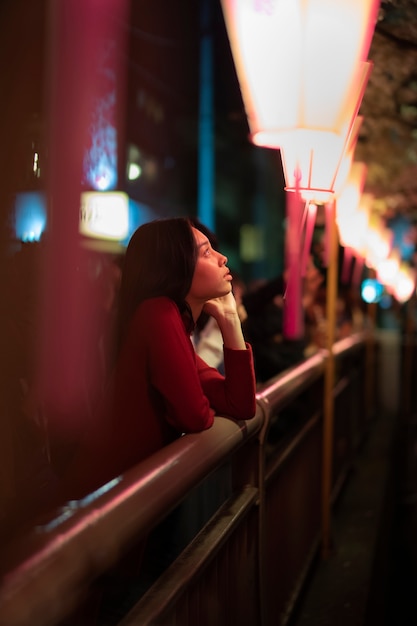 Free Photo lifestyle of night in the city with young woman