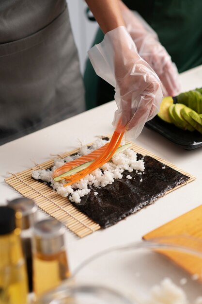 Lifestyle: people learning to make sushi