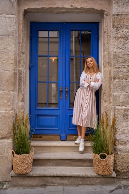 Free photo lifestyle of person decorating their front door