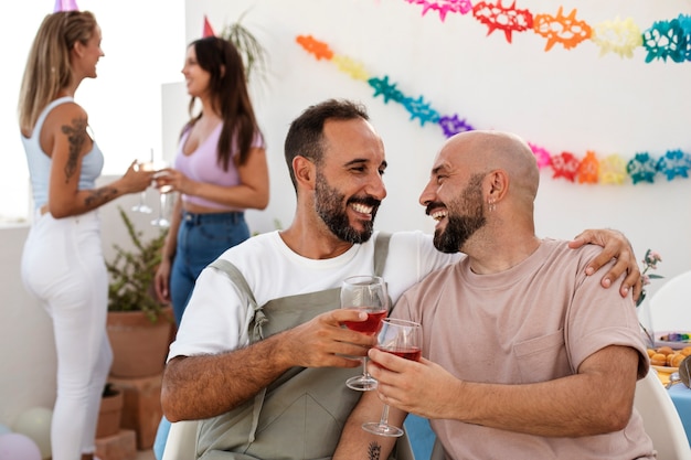 Free Photo lifestyle queer couples celebrating birthday