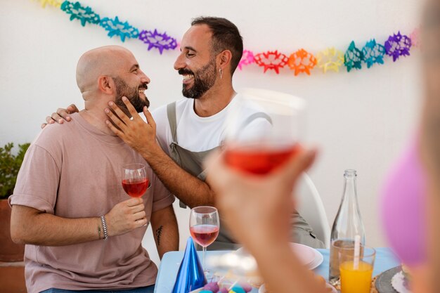 Lifestyle queer couples celebrating birthday