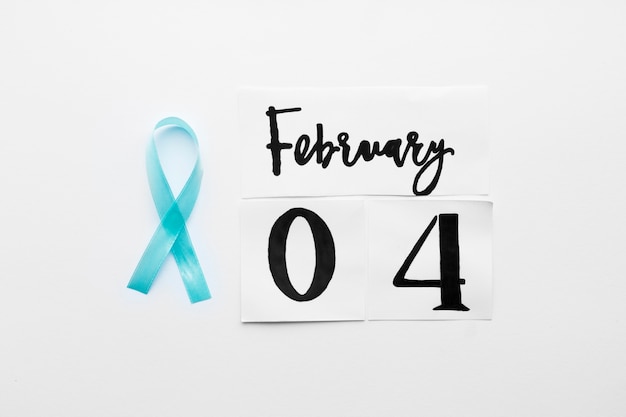 Light blue ribbon and February 4 writing