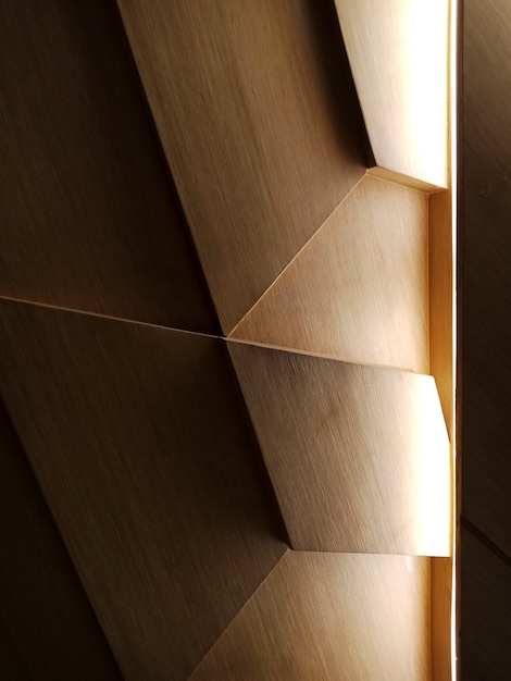 Free Photo light falling on a wooden abstract design