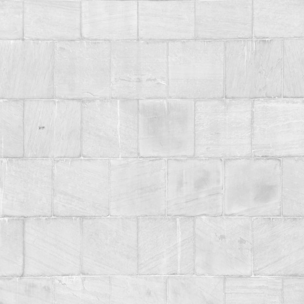 Free Photo light gray stone brick wall