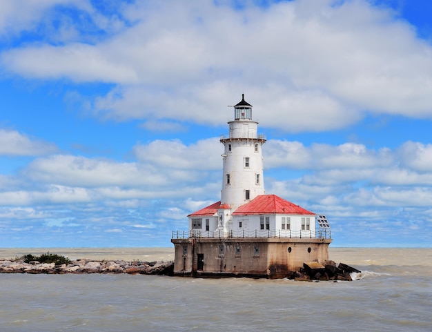 Light House of Chicago in Lake Michigan with cloud and blue sky.