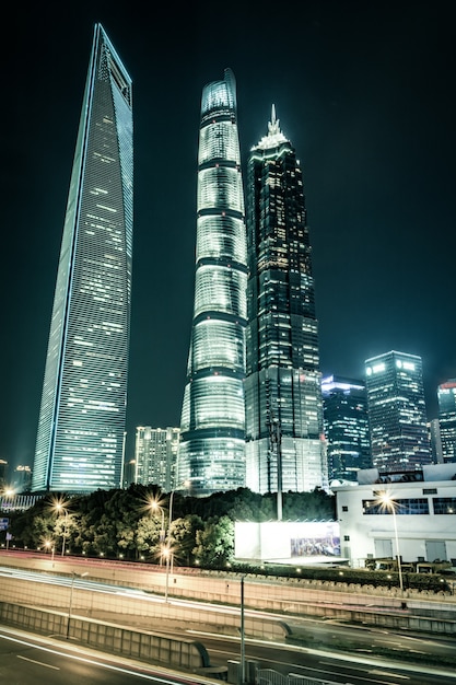 Free Photo light trails on the modern building background in shanghai china