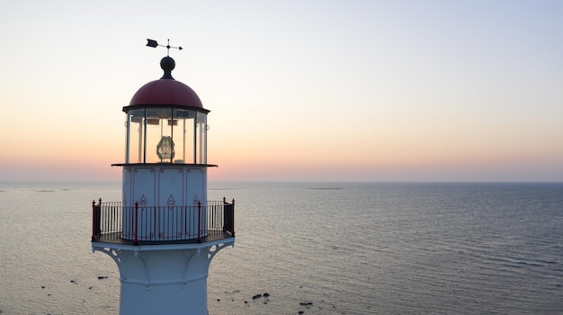 Lighthouse on the Kihnu island in Estonia during a beautiful sunset