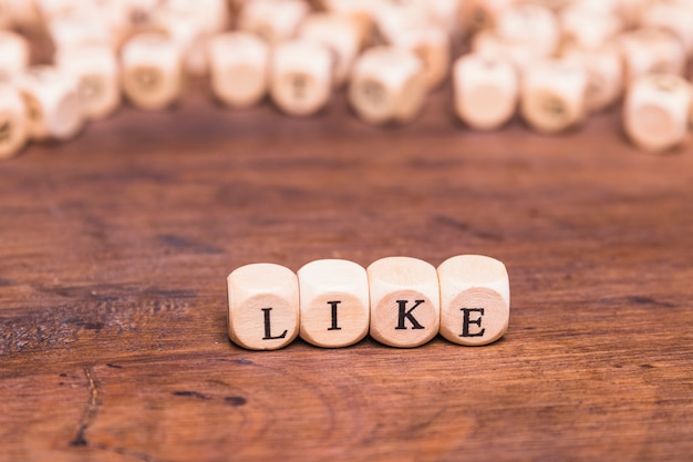 Like message made with cubes arranged on desk