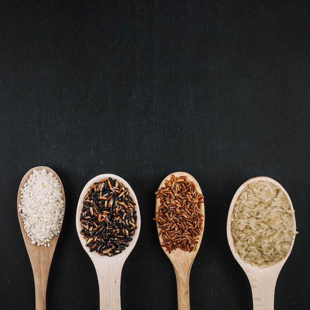 Line of spoons with rice