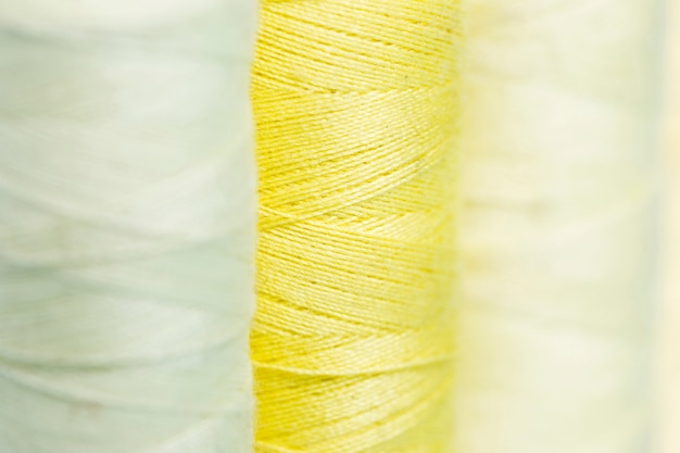 Free Photo line of yellow thread reals