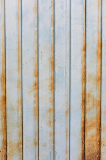 Free photo lines on rusty metallic surface