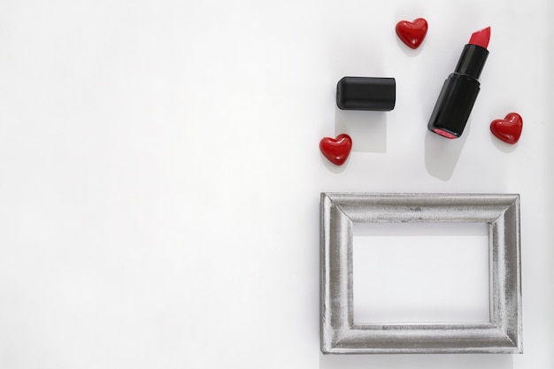 Free photo lipstick, hearts and frame