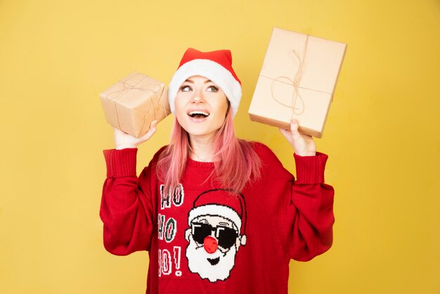 Listening girl with gifts in hands