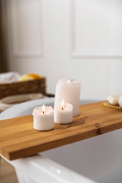 Free Photo lit candles in bathroom