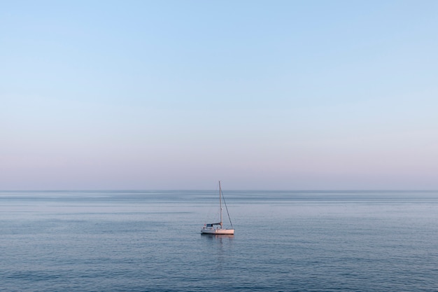 Free Photo little boat in the middle of the sea