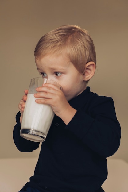 Little boy drinking milk