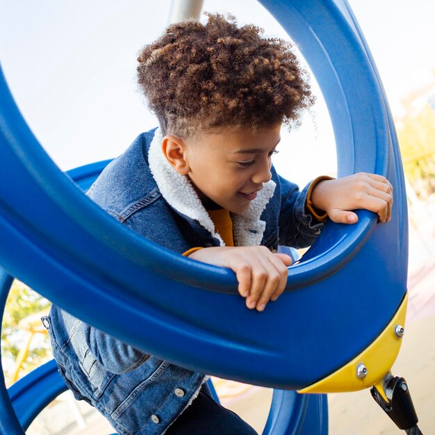 Little boy having fun at the playground