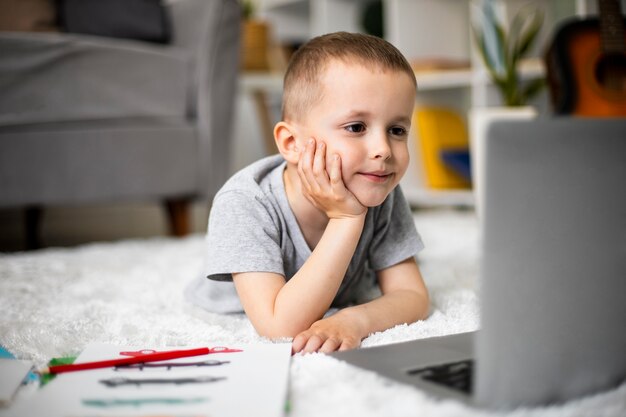 Little boy learning how to draw