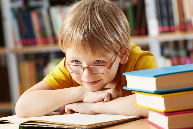 Little boy smiling at the library