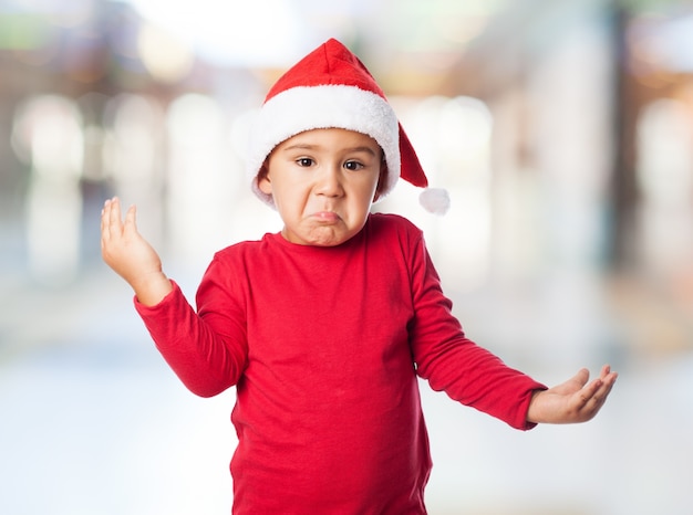 Little boy with gestures of concern