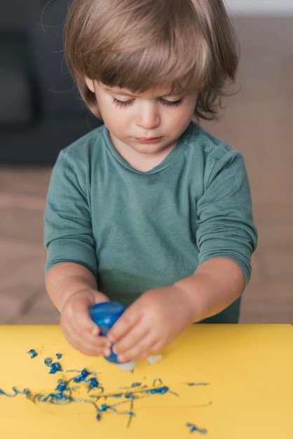 Free Photo little child painting like an artist