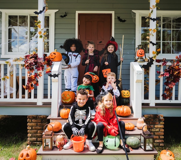 Free Photo little children in halloween costumes