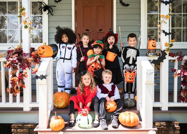 Free photo little children in halloween costumes