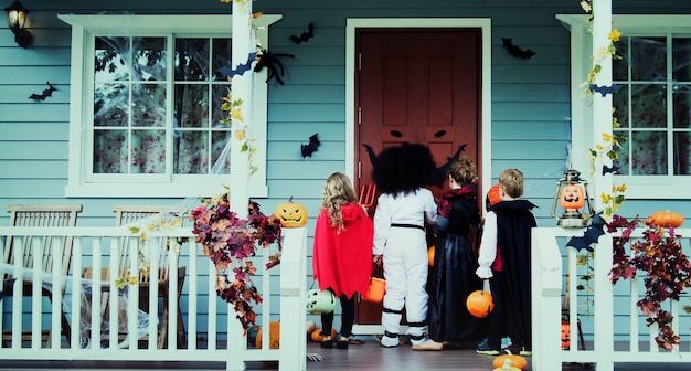 Free photo little children trick or treating