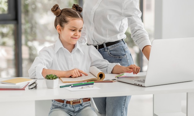 Little girl being ready for a new class