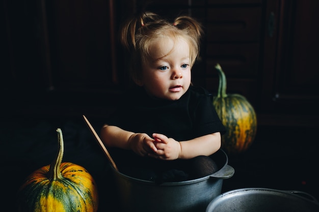 Little girl in a bucket