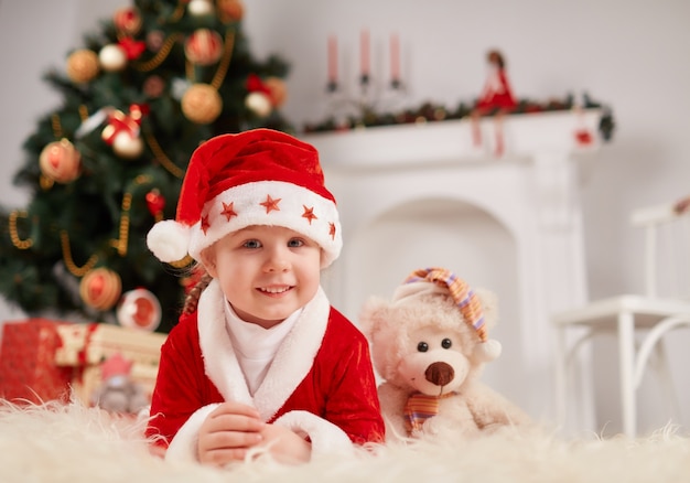 Free Photo little girl dressed in santa